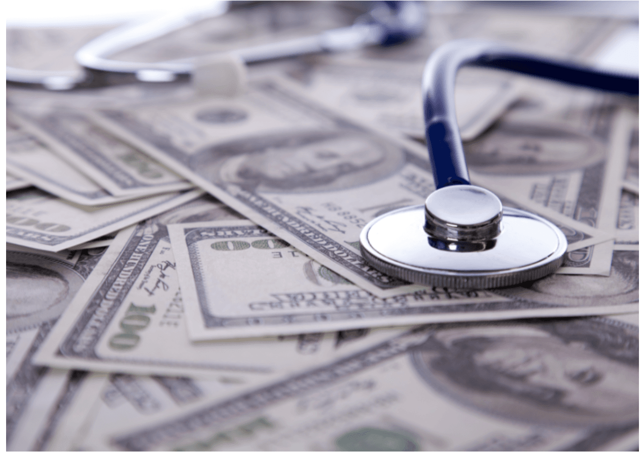 Stethoscope on money